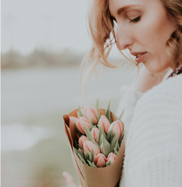 a woman with flowers